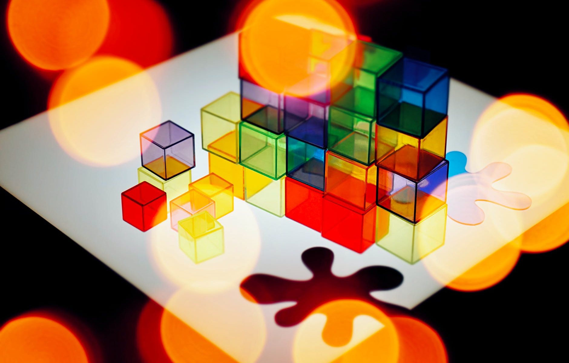 colorful cubes and puzzle piece