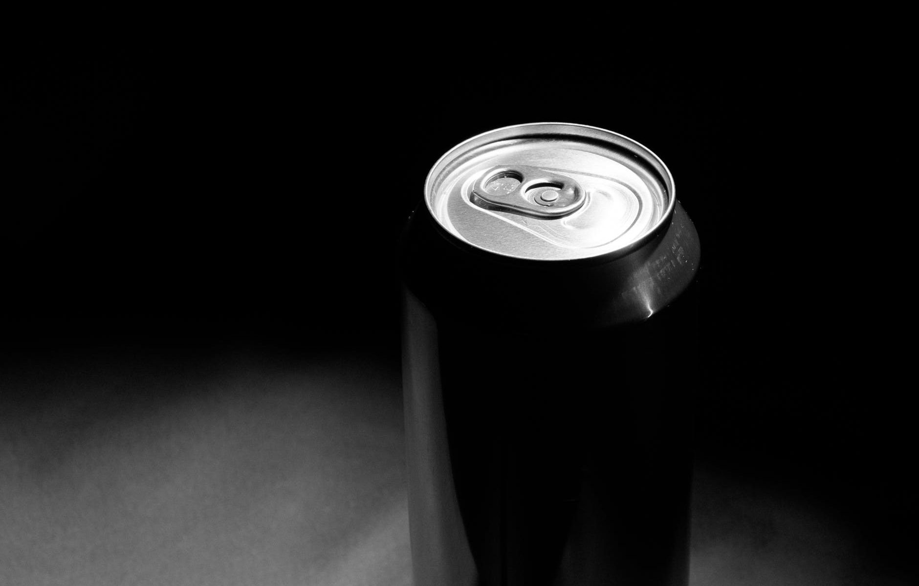 grayscale photo of a can