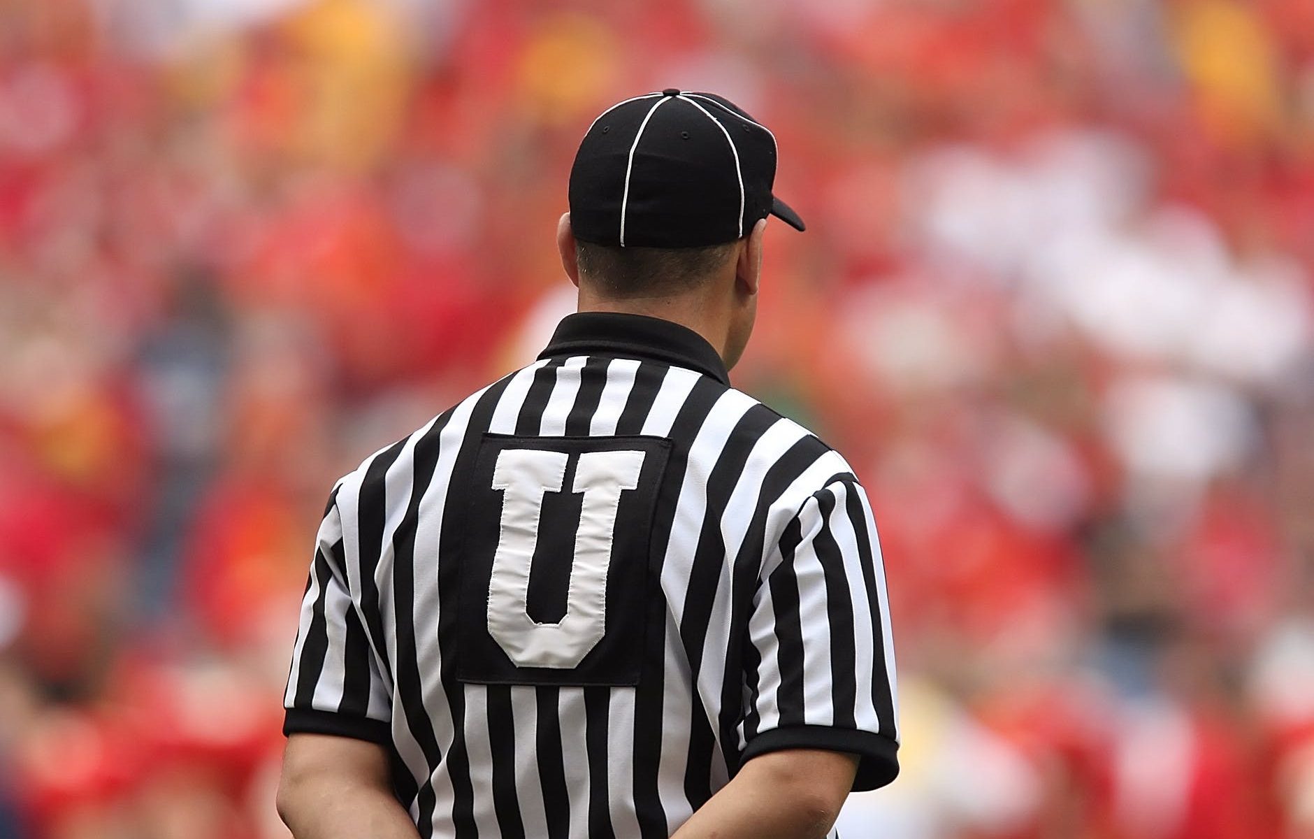 selective focus photography of male umpire