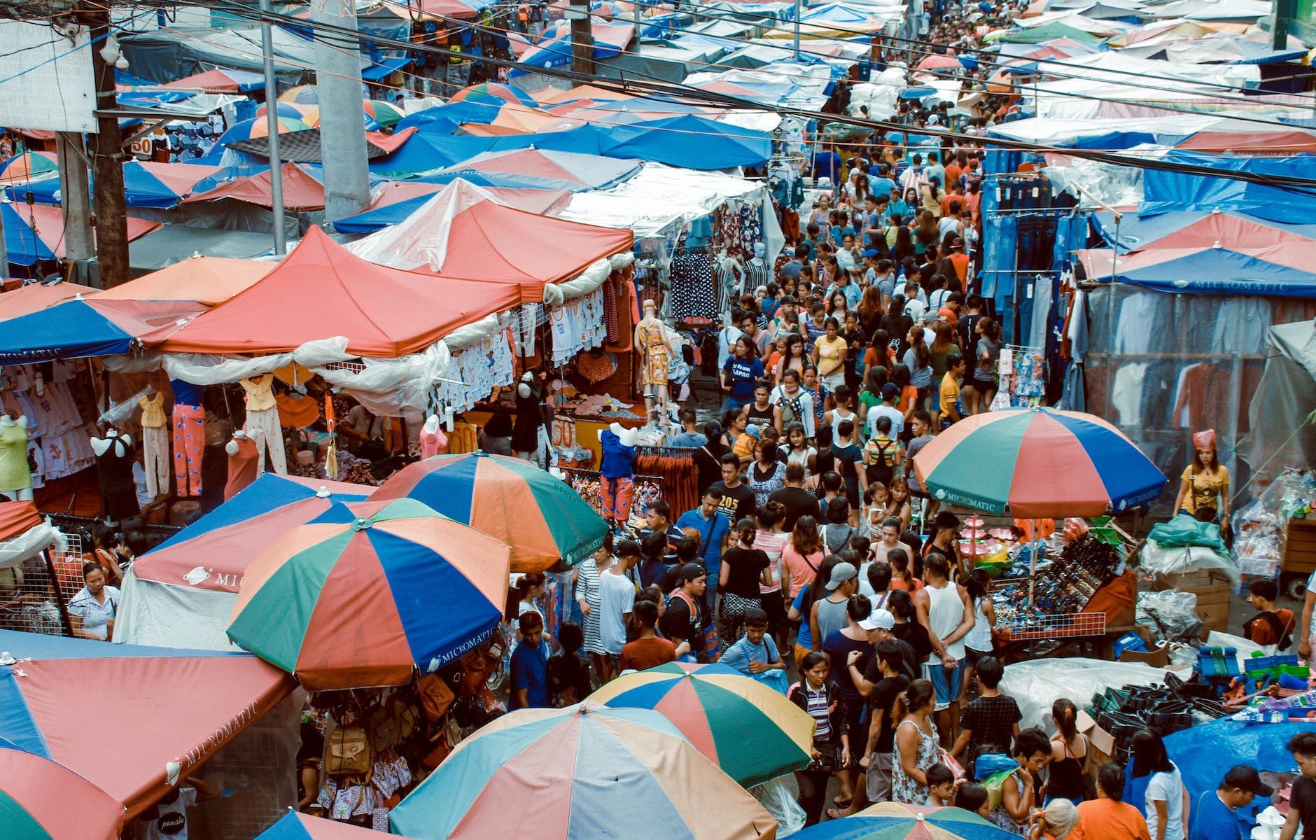 photo of crowd of people in the market